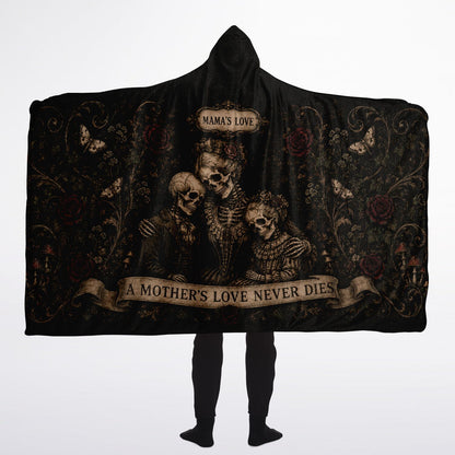 A Mother’s Love Never Dies Hooded Blanket 60x80 – oversized cozy sherpa hooded blanket featuring a skeleton family surrounded by dark roses and butterflies. warm