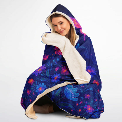 Cosmic Garden Wings Hooded Blanket 45x60 – soft sherpa fleece with glowing butterflies and cosmic flowers under starlit sky