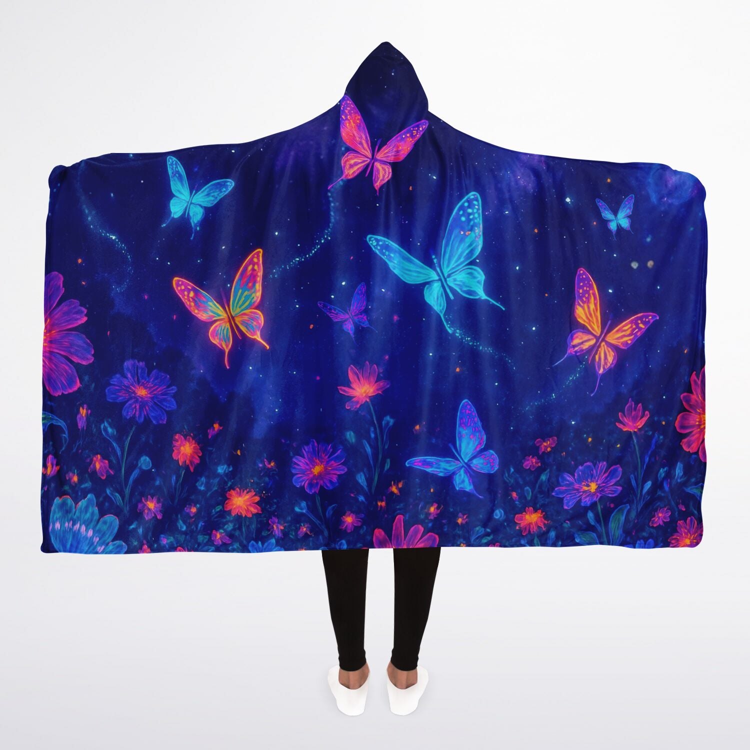 Butterfly Hooded Blanket 45x60 – soft fleece hooded blanket featuring glowing neon butterflies in vibrant blue, pink, and purple tones floating over a cosmic night-sky background full of stars and floral sparkles. Perfect for teens, butterfly lovers, cozy nights, and aesthetic bedroom décor.