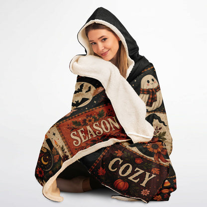 Cozy Spooky Mama Halloween Hooded Blanket 45x60 – ultra-soft fleece hooded blanket featuring a vintage Halloween patchwork design for moms, ultra cozy