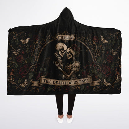 Eternal Love Skeleton Couple Hooded Blanket 45x60 – ultra-soft fleece hooded blanket featuring a romantic gothic skeleton couple surrounded by dark roses