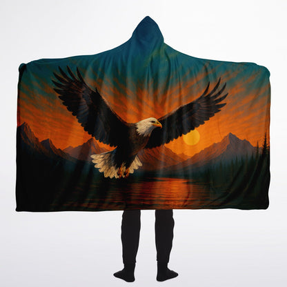 Wings of Freedom Hooded Blanket 60x80 – premium sherpa-lined hooded blanket showcasing a soaring bald eagle above tranquil mountains and a glowing sunset, ideal for outdoor adventures, nature lovers, and everyday comfort
